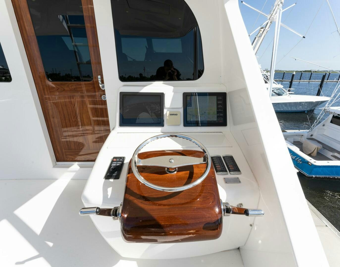 a white car with a large stack of pancakes on it aboard HIGH COTTON Yacht for Sale