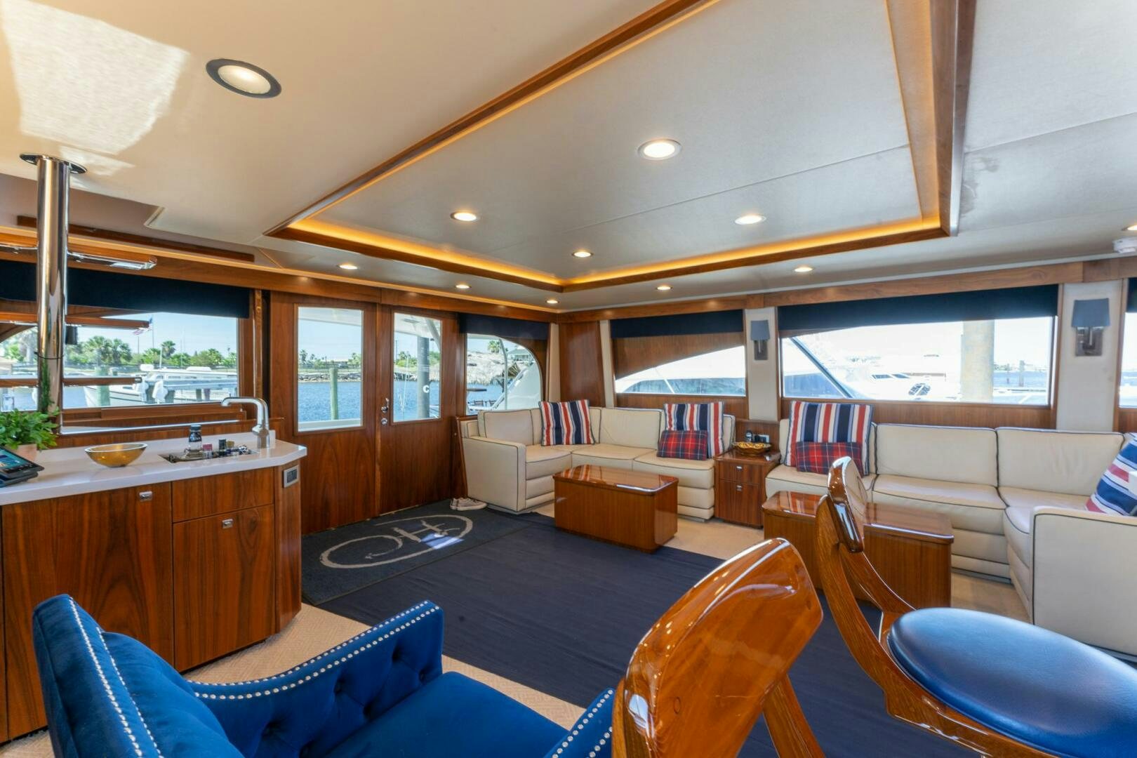 a living room with a large window aboard HIGH COTTON Yacht for Sale
