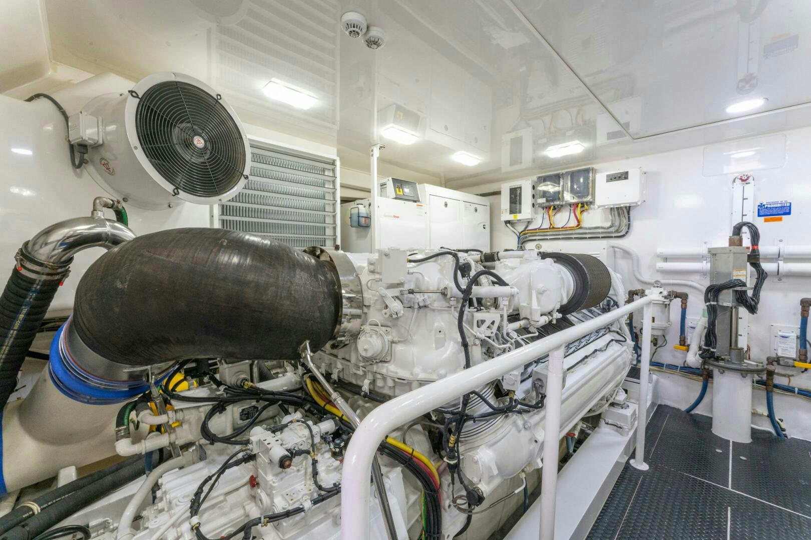 a room with white pipes and pipes aboard HIGH COTTON Yacht for Sale