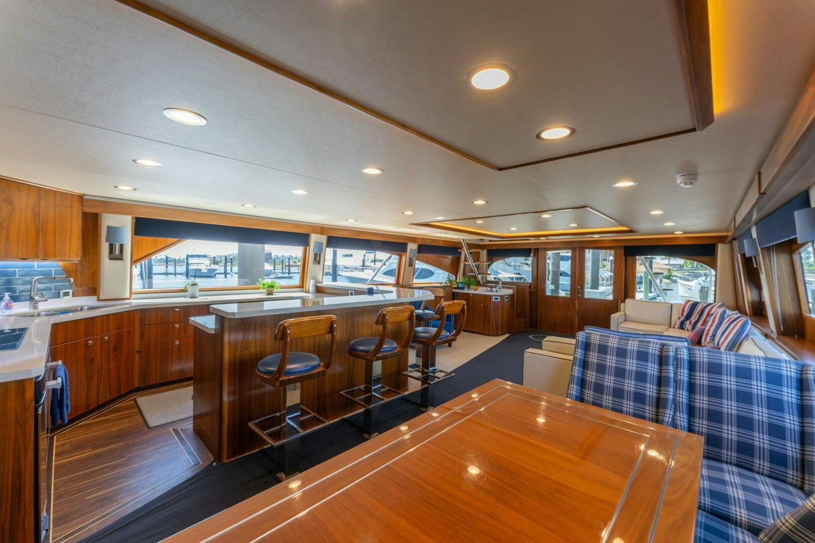a large kitchen and dining area aboard HIGH COTTON Yacht for Sale