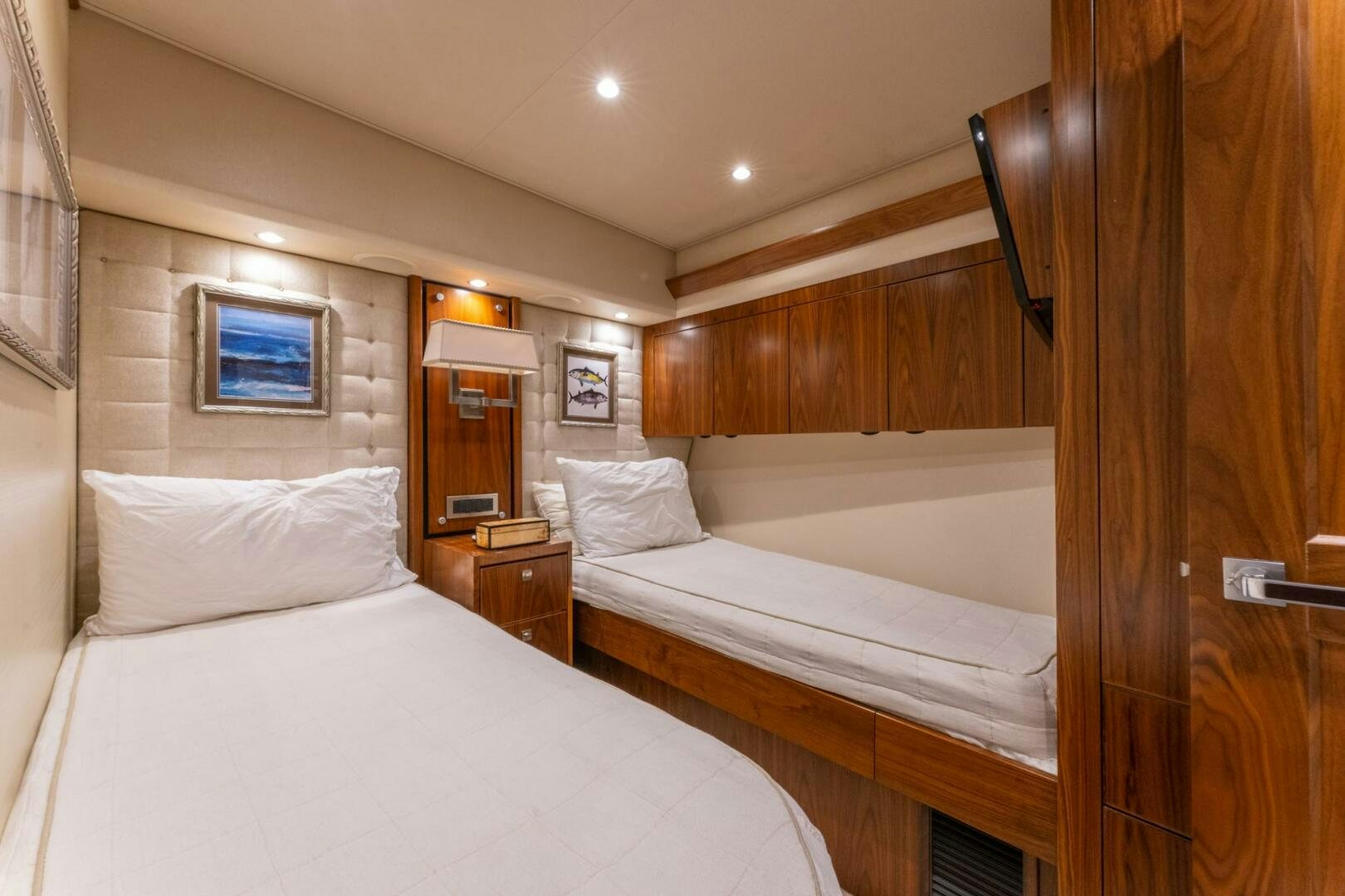 a room with two beds aboard HIGH COTTON Yacht for Sale