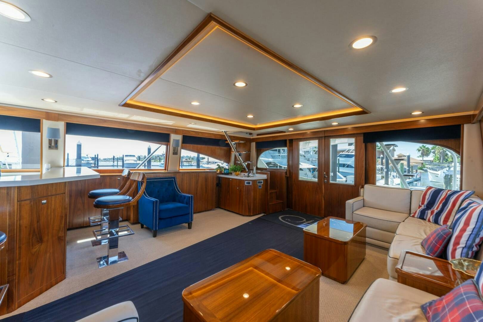 a living room with a large open window aboard HIGH COTTON Yacht for Sale