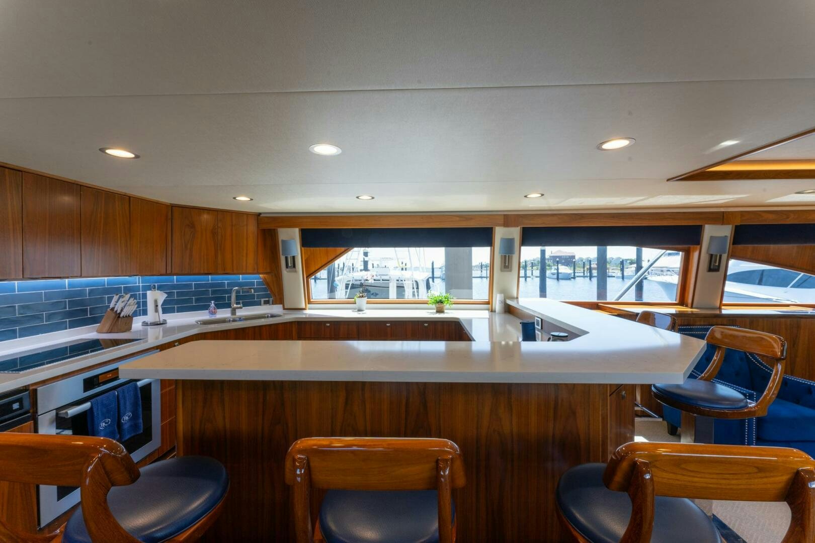 a kitchen with a large island aboard HIGH COTTON Yacht for Sale