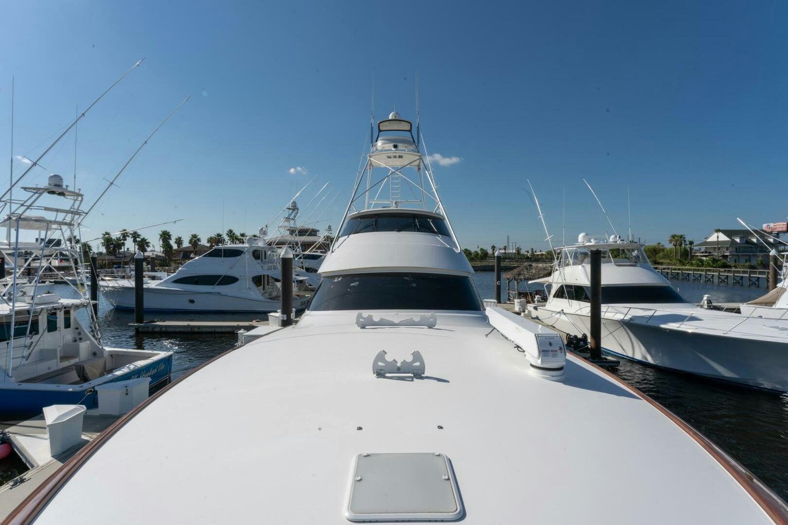 a group of boats are parked at a dock aboard HIGH COTTON Yacht for Sale