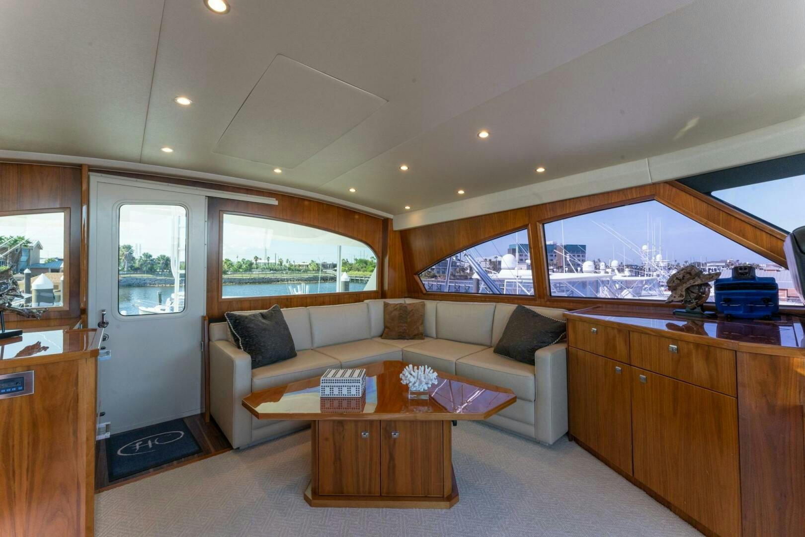 a living room with a couch and a coffee table aboard HIGH COTTON Yacht for Sale