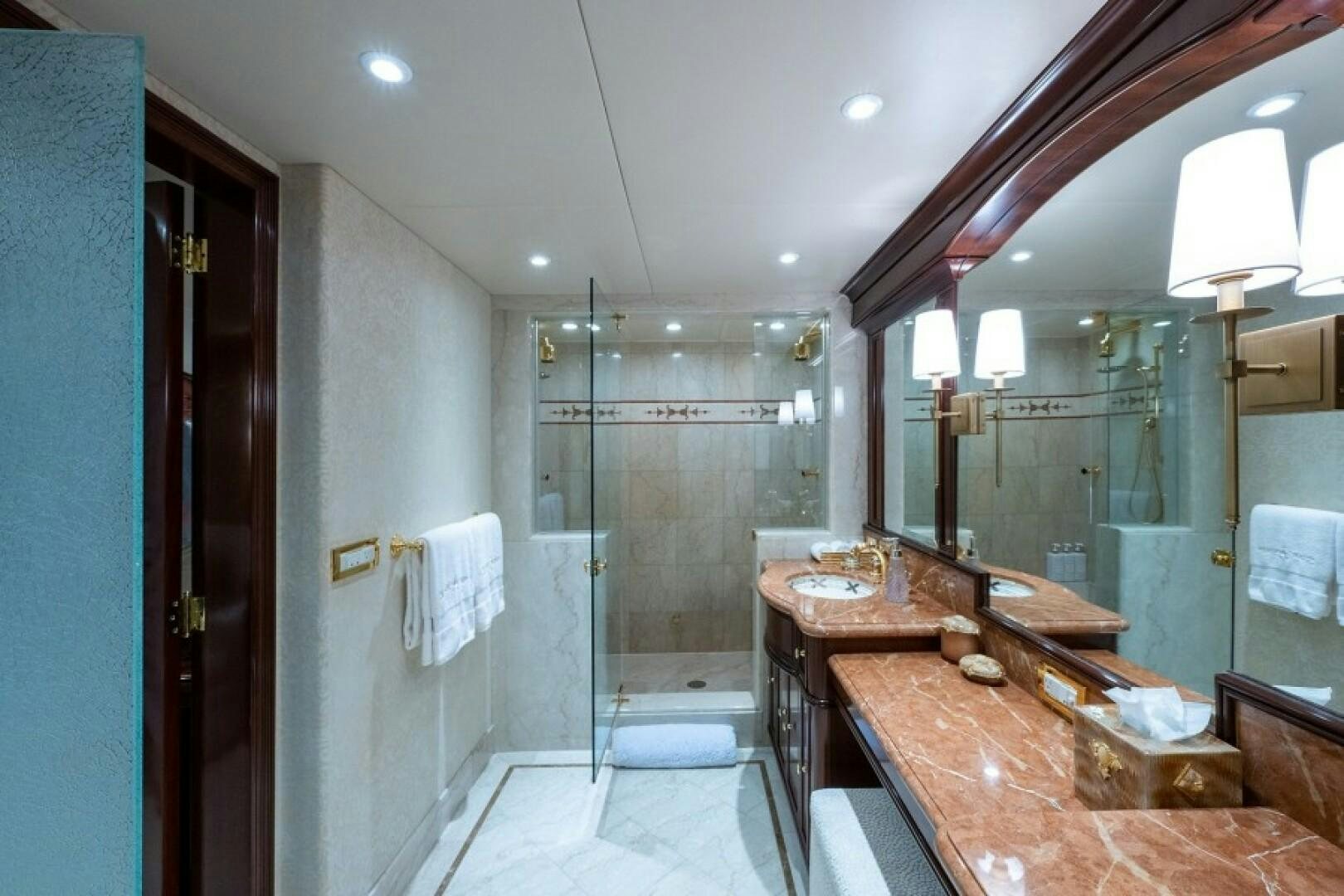 a bathroom with a marble counter top aboard STARSHIP Yacht for Sale