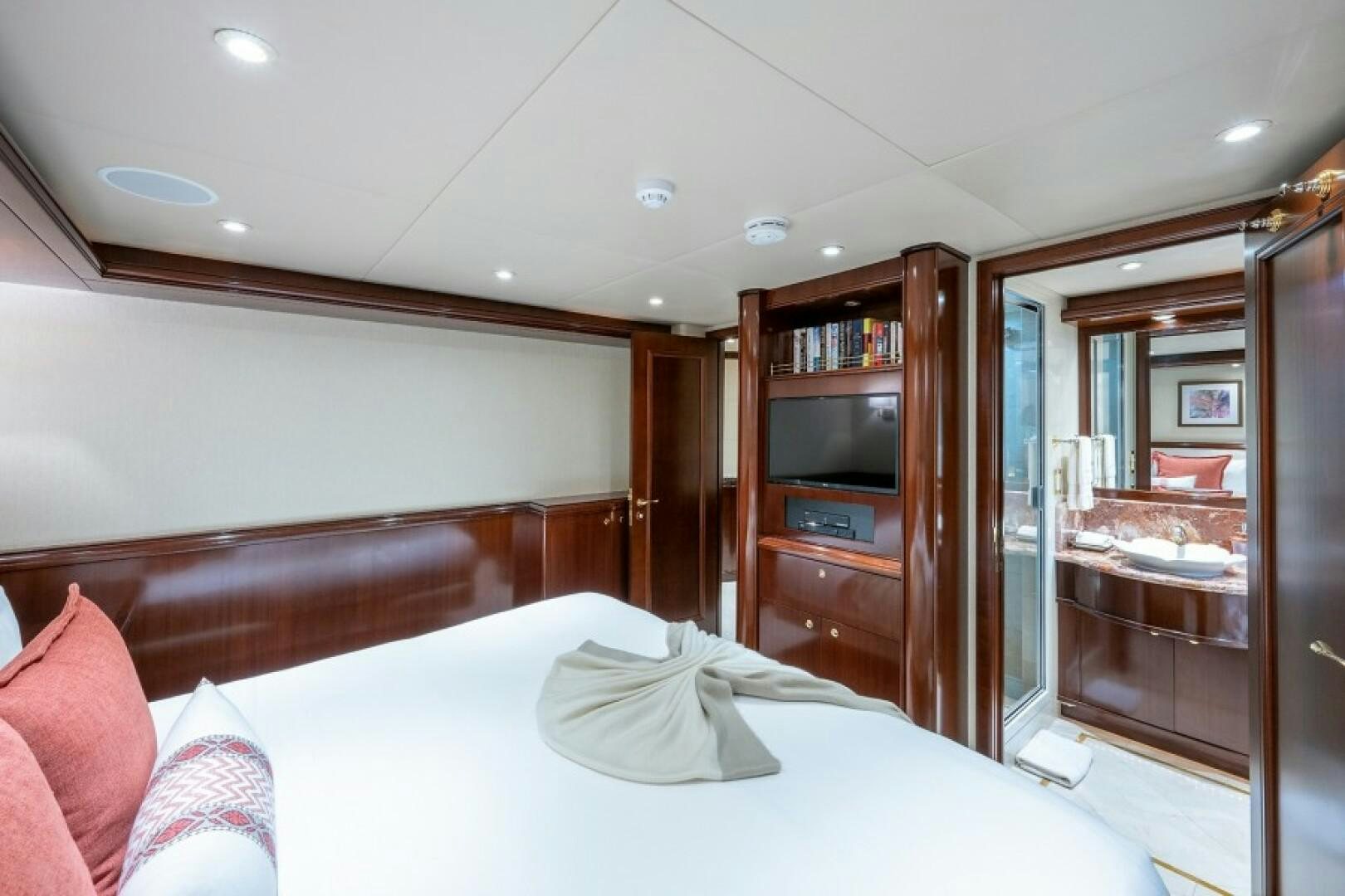 a bed in a room aboard STARSHIP Yacht for Sale