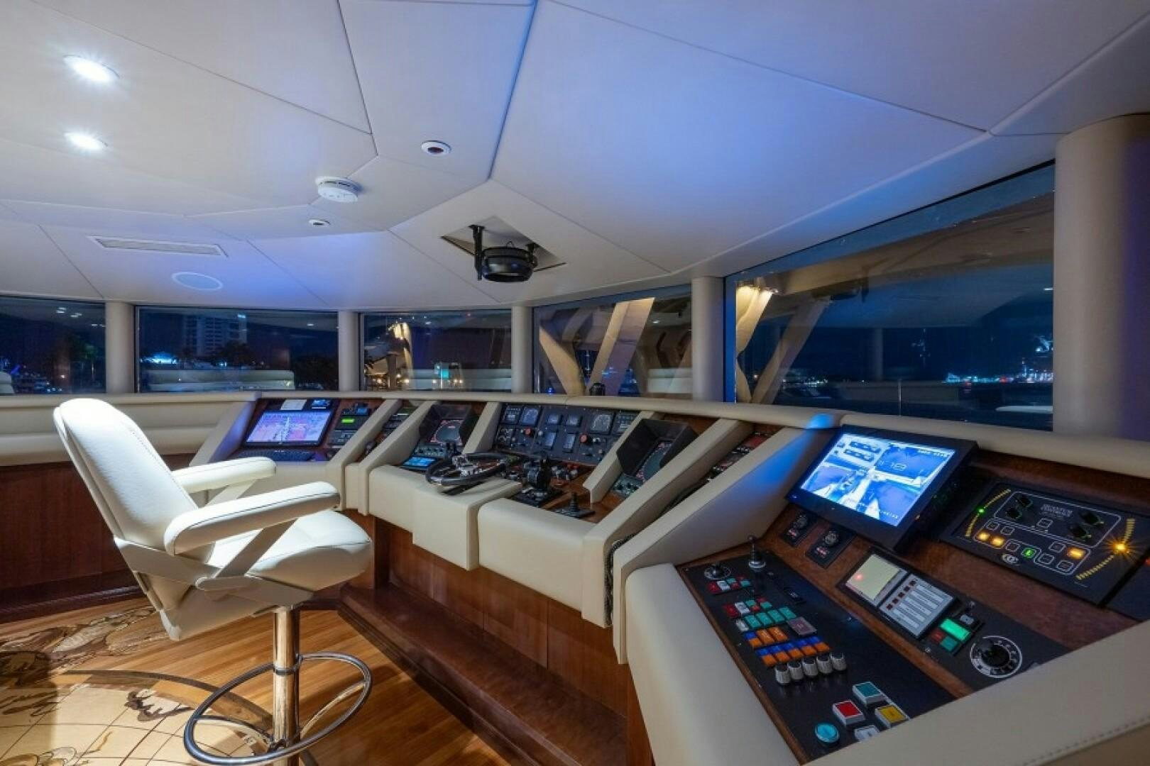 a room with computers and monitors aboard STARSHIP Yacht for Sale