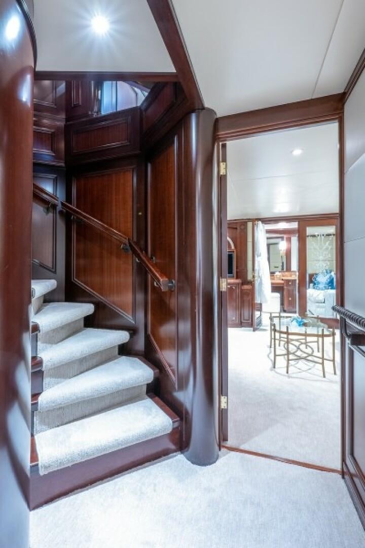 a staircase in a house aboard STARSHIP Yacht for Sale