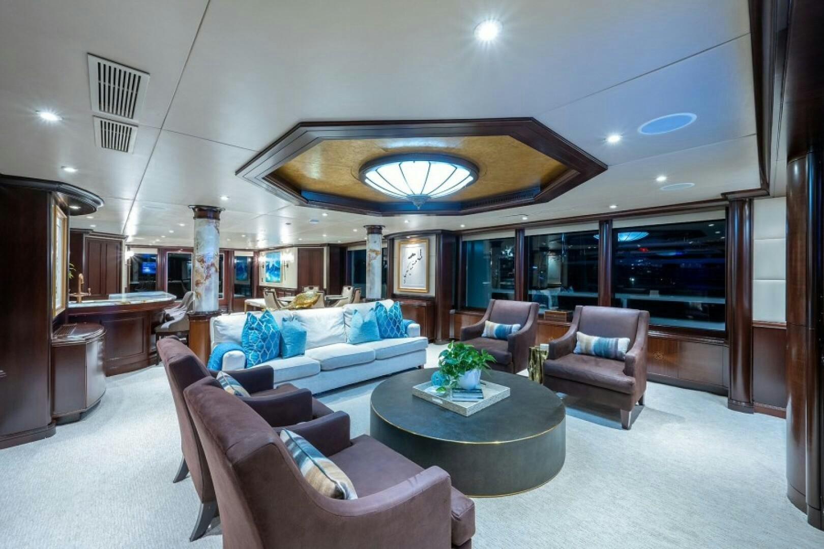 a living room with a large open floor plan aboard STARSHIP Yacht for Sale