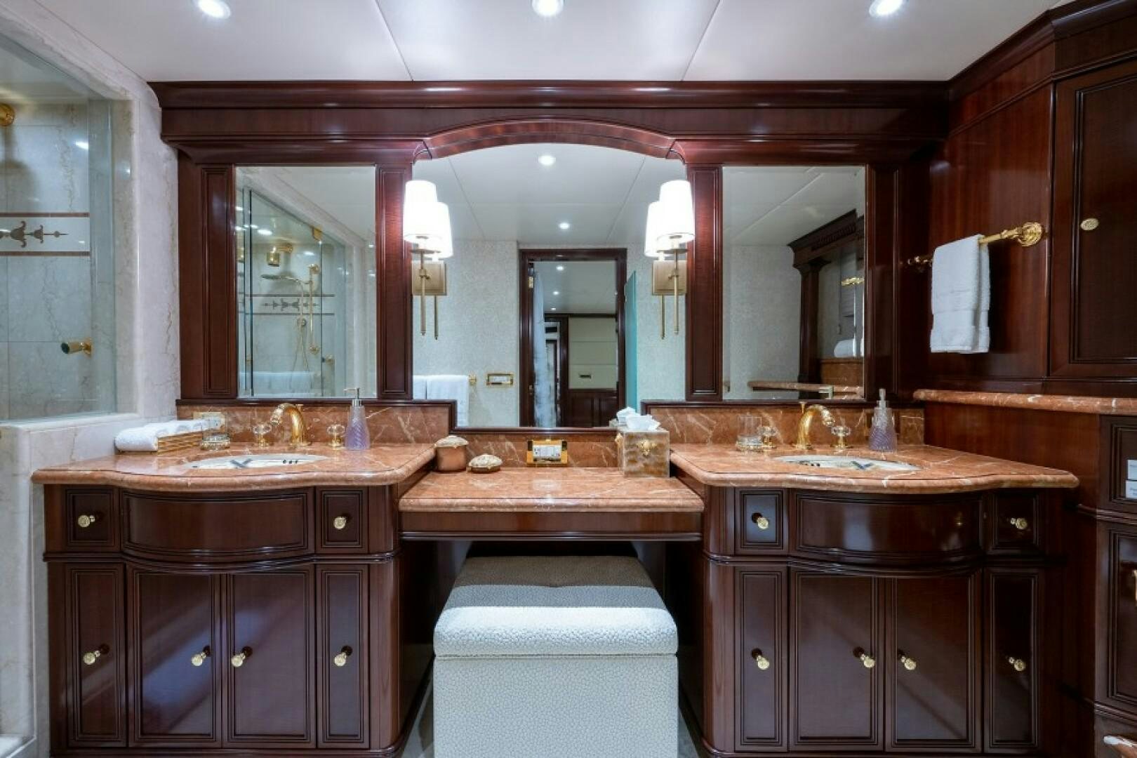 a bathroom with a large mirror aboard STARSHIP Yacht for Sale