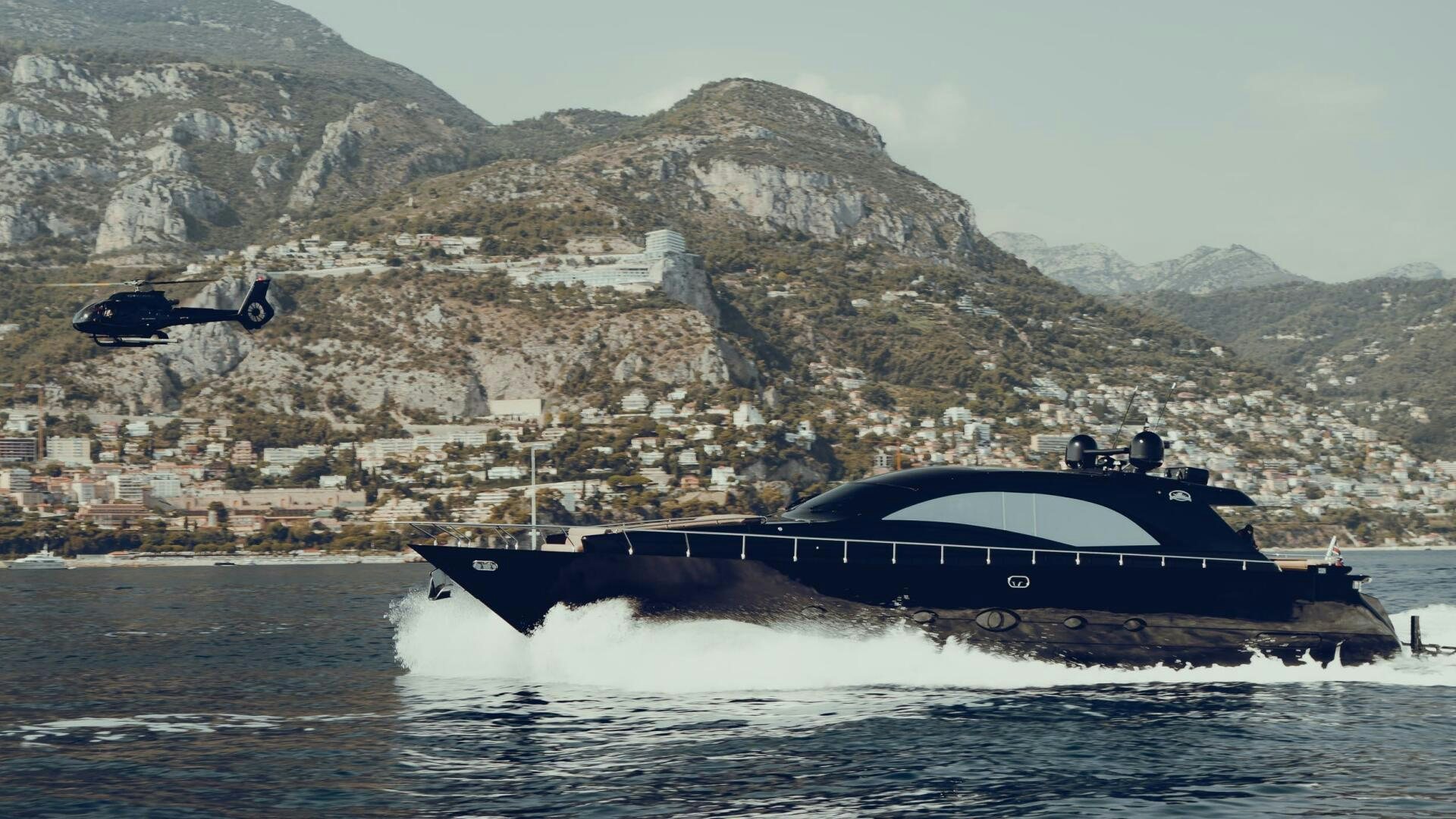 a person in a boat aboard BLACK ROCK Yacht for Sale