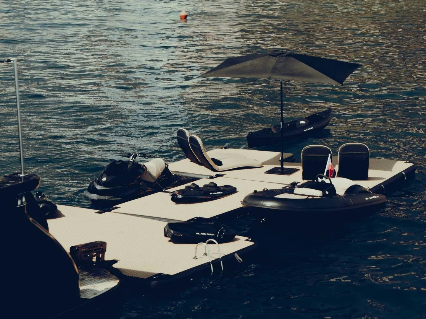 a group of boats in the water aboard BLACK ROCK Yacht for Sale