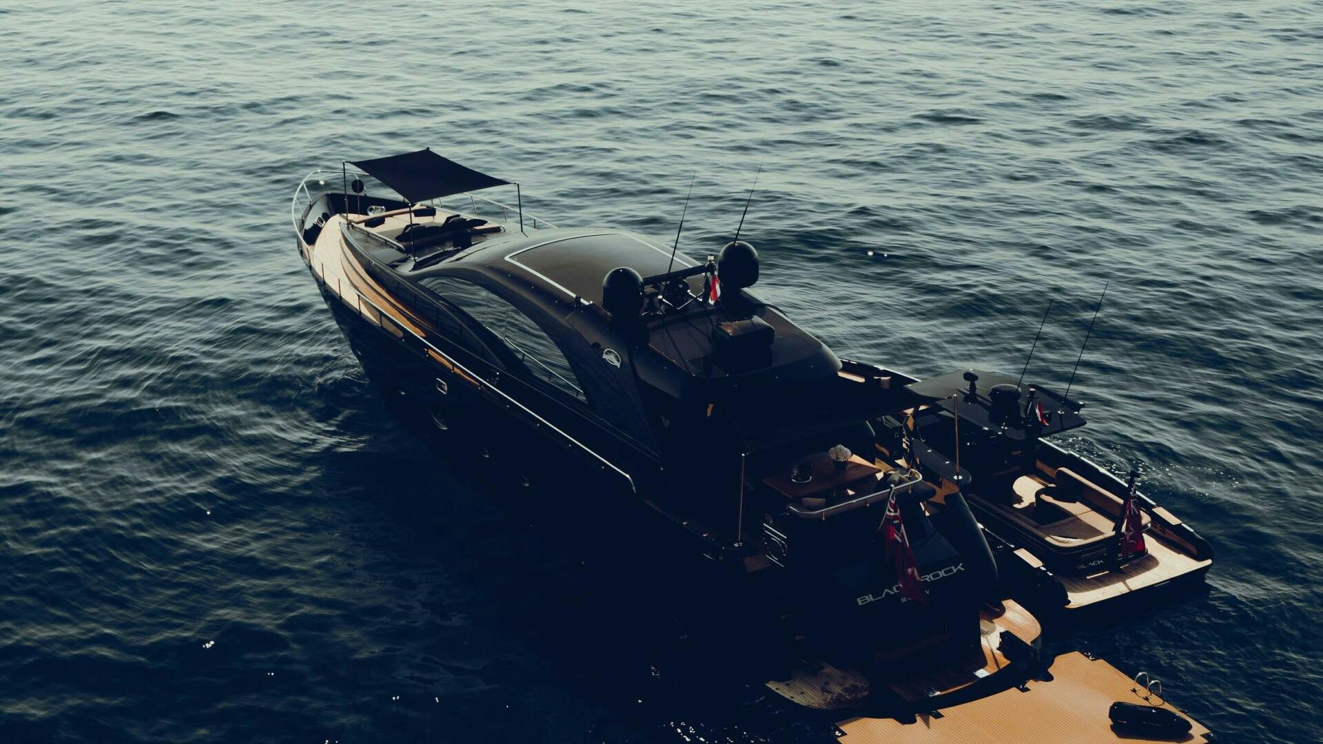 a boat in the water aboard BLACK ROCK Yacht for Sale
