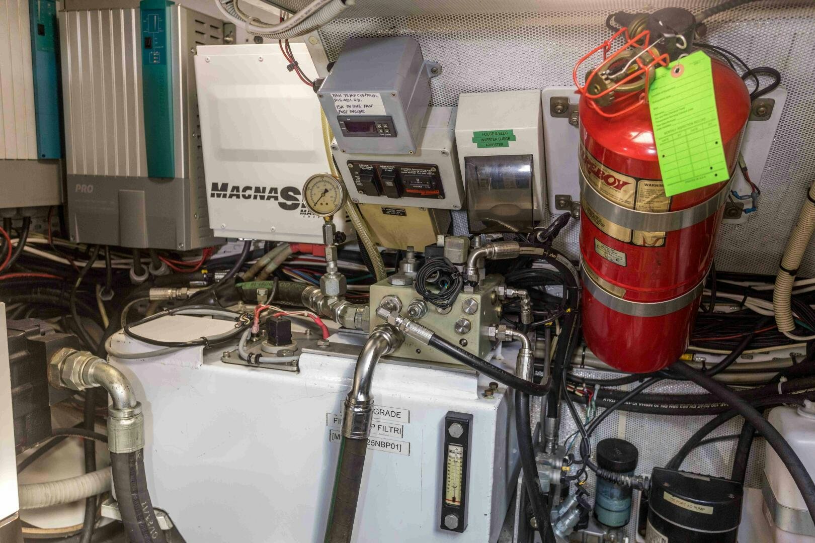 a machine with a red and yellow cap aboard LADY K Yacht for Sale