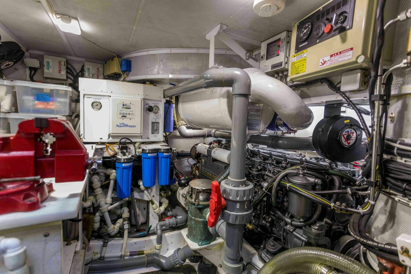 a machine with a large metal cylinder aboard LADY K Yacht for Sale