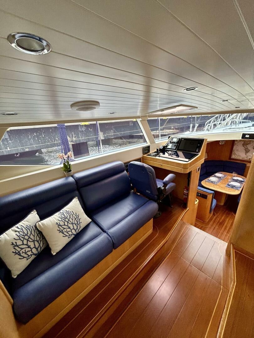 a room with a desk and a computer aboard LADY K Yacht for Sale