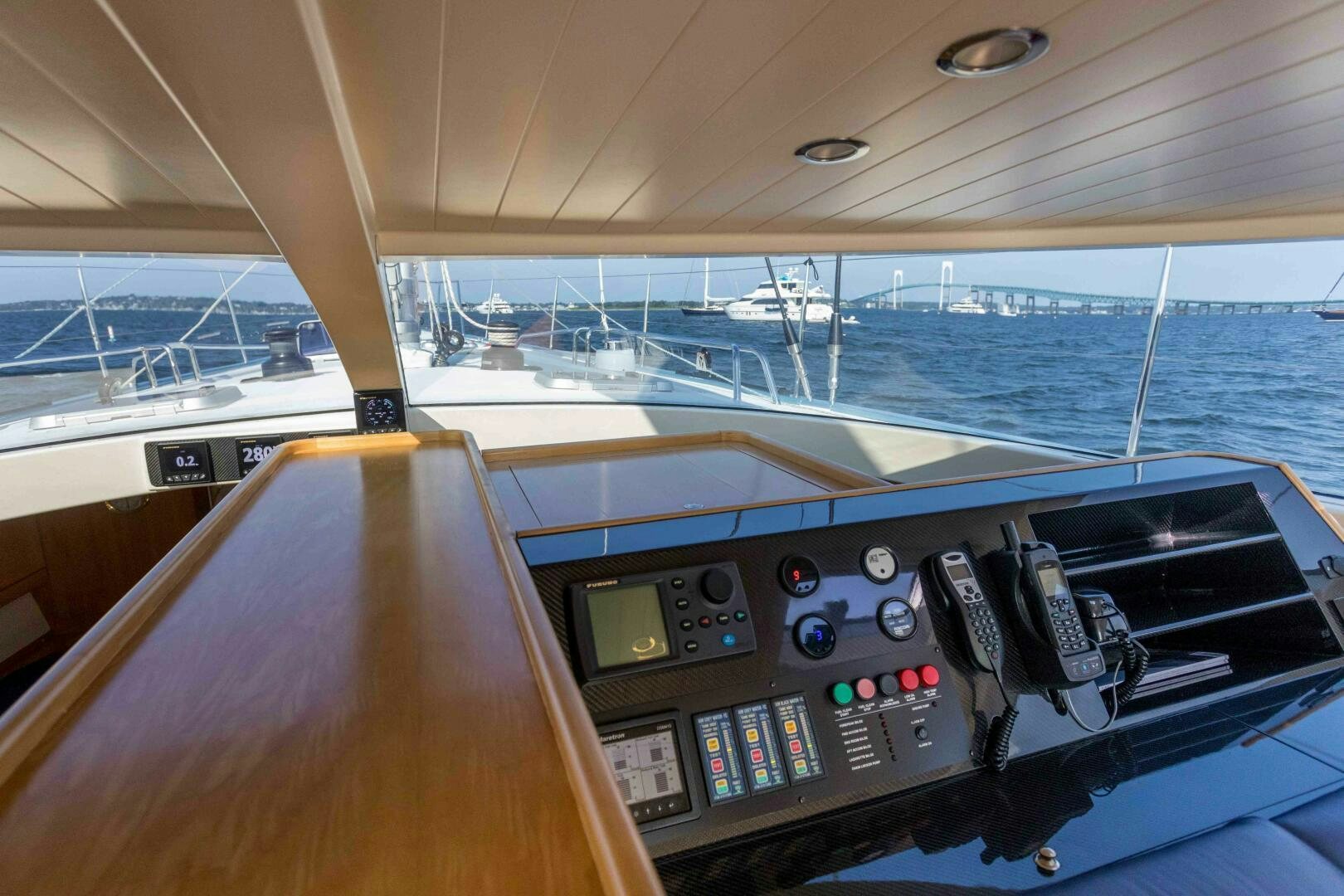 a boat with a view of the water and the land below aboard LADY K Yacht for Sale