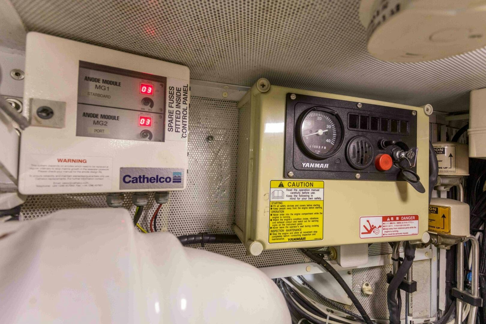 a person in a room with a machine aboard LADY K Yacht for Sale