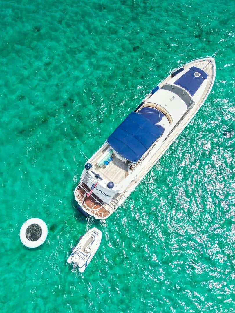 a white and grey object on grass aboard THE SHI Yacht for Sale