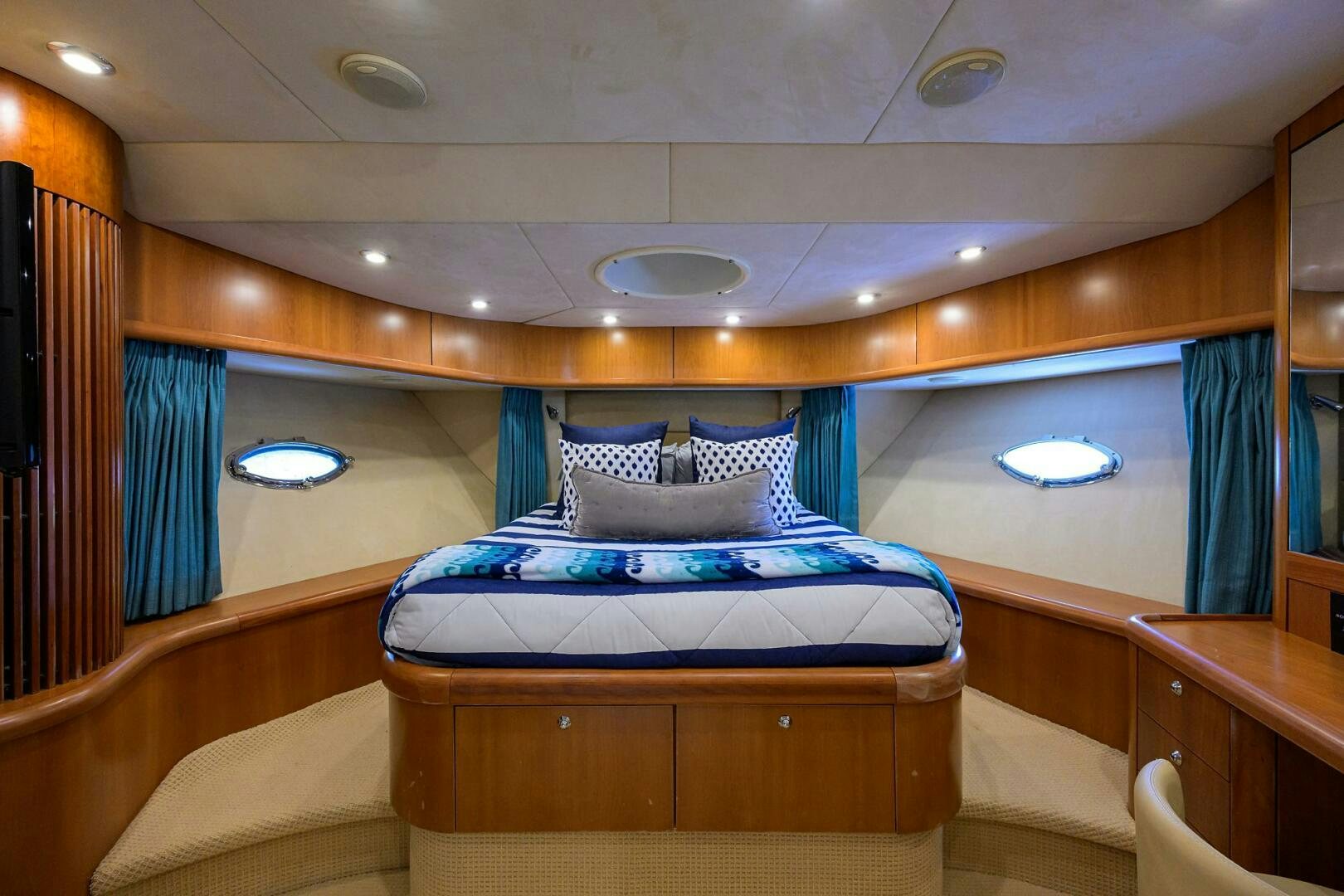 a room with a bed and a window aboard THE SHI Yacht for Sale