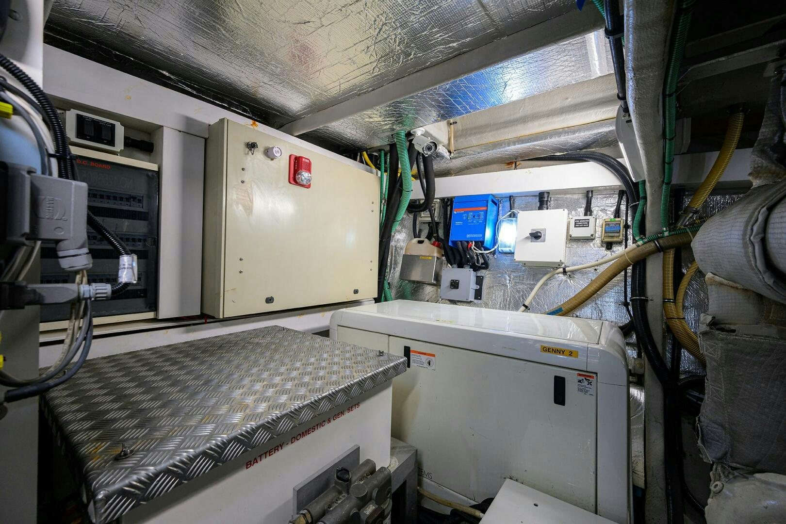 a large machine with a large piece of equipment in it aboard THE SHI Yacht for Sale