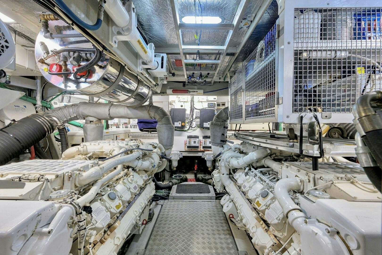 a large factory with many machines aboard THE SHI Yacht for Sale