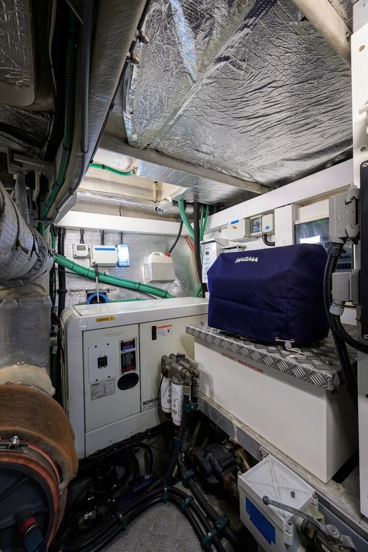a room with a machine and equipment aboard THE SHI Yacht for Sale