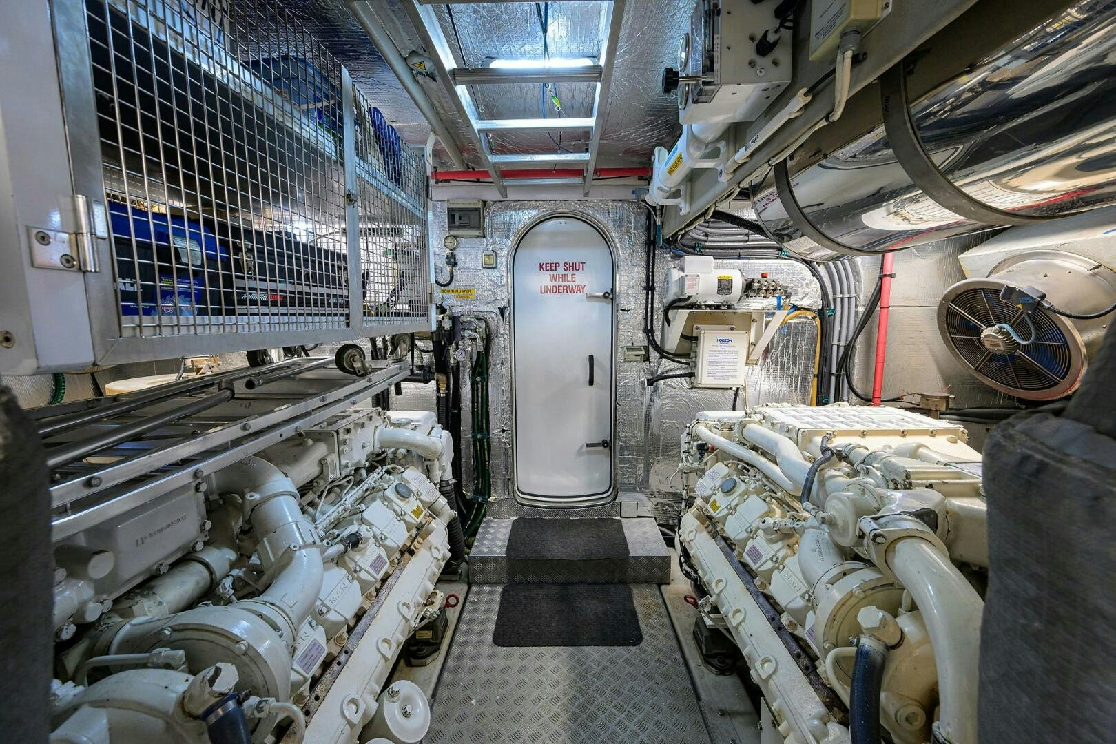 a room with machinery aboard THE SHI Yacht for Sale