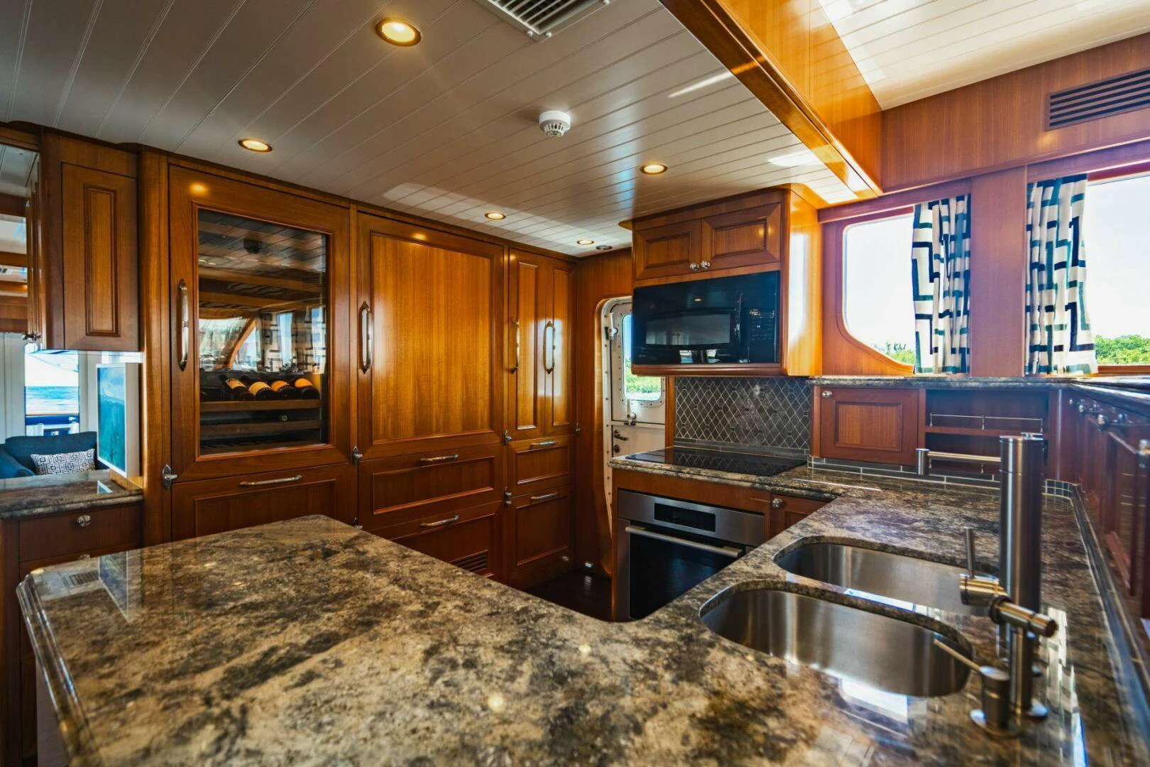 a kitchen with granite counter tops aboard MOONSHOT Yacht for Sale