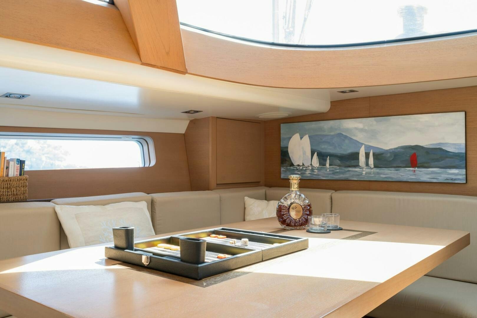 a living room with a large window aboard HANNO Yacht for Sale