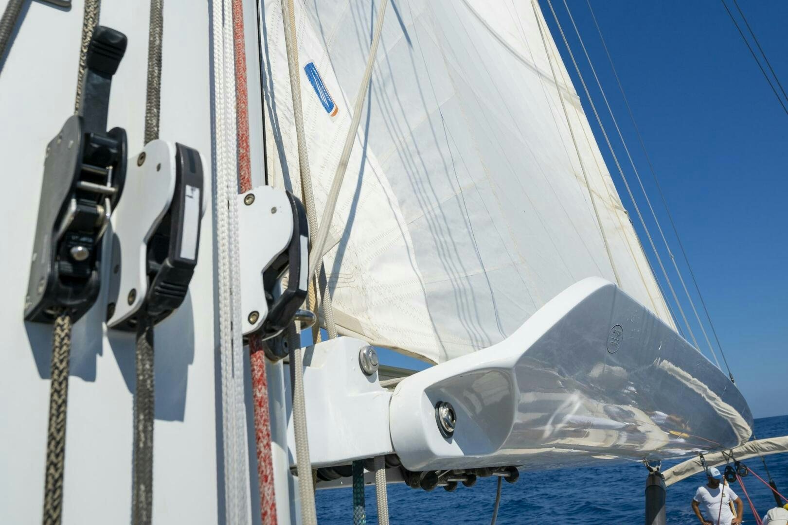 a sailboat with a white sail aboard HANNO Yacht for Sale