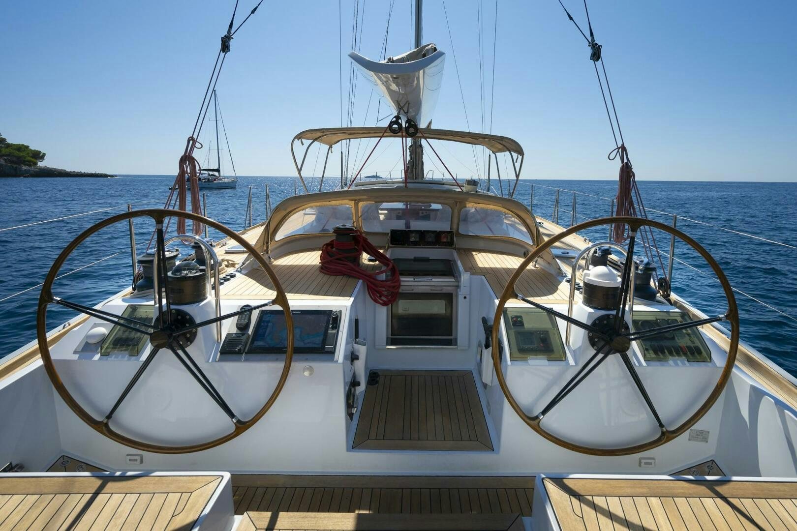 a boat with a steering wheel aboard HANNO Yacht for Sale