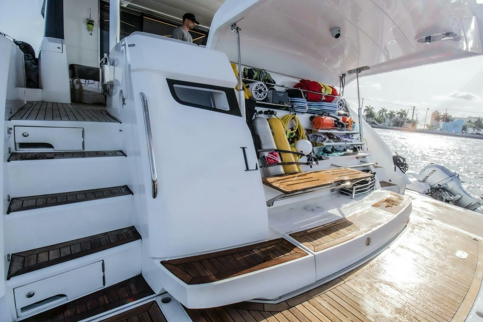 a white machine on a wooden surface aboard LAGO PARADISE Yacht for Sale