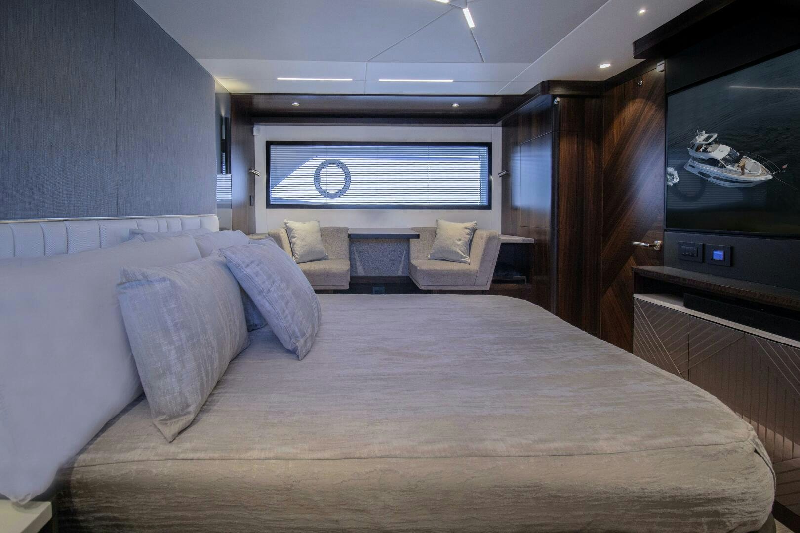 a bed in a room aboard LAGO PARADISE Yacht for Sale