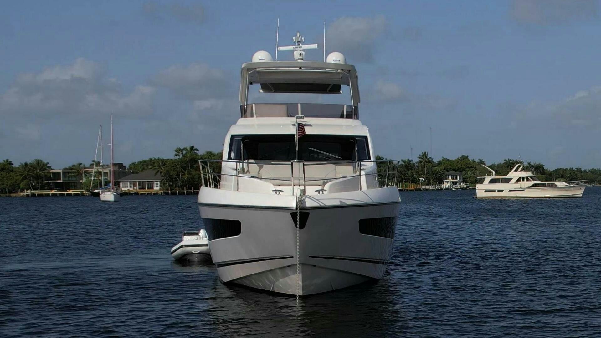a white yacht in the water aboard LAGO PARADISE Yacht for Sale
