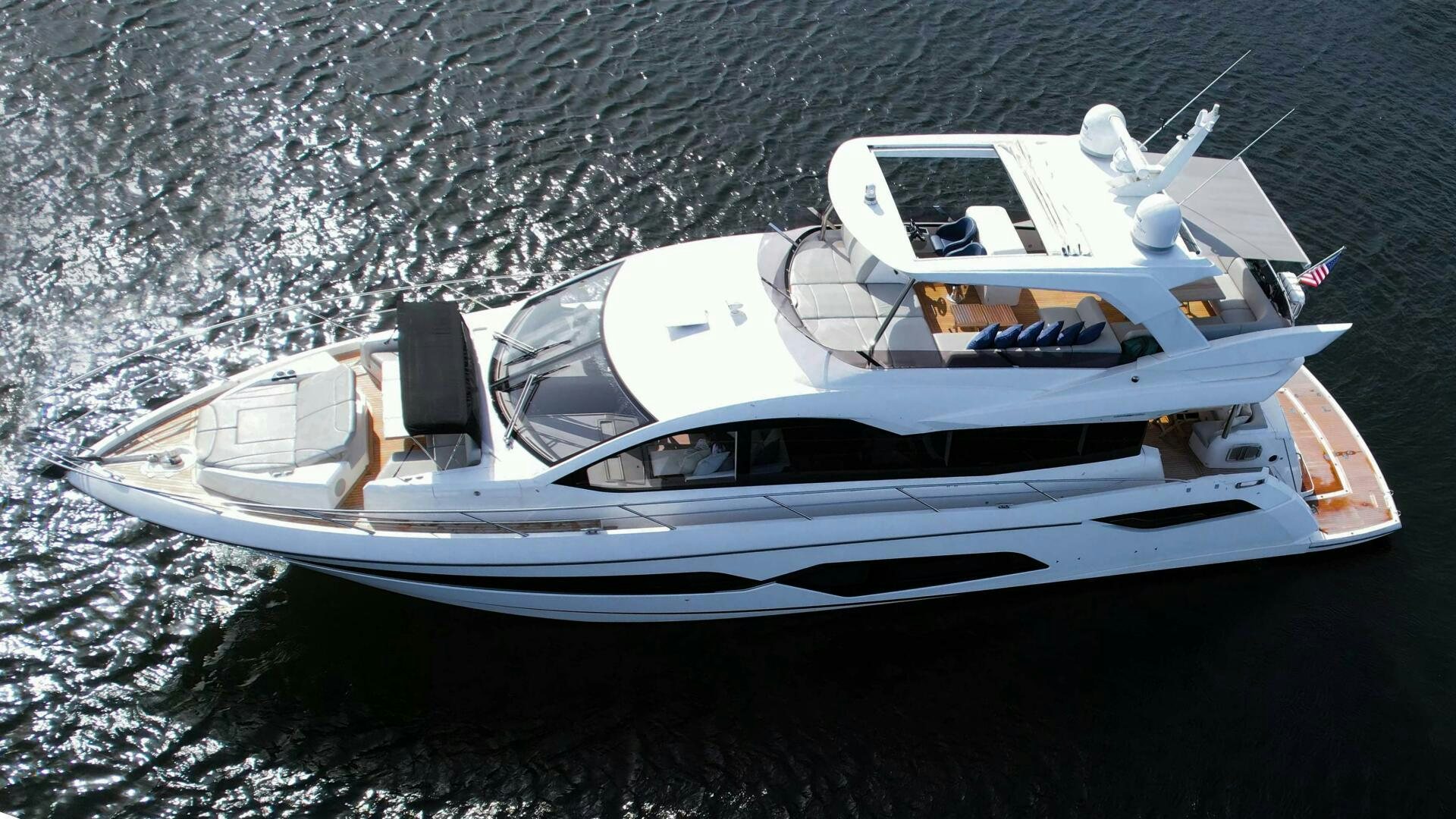 a white yacht in the water aboard LAGO PARADISE Yacht for Sale