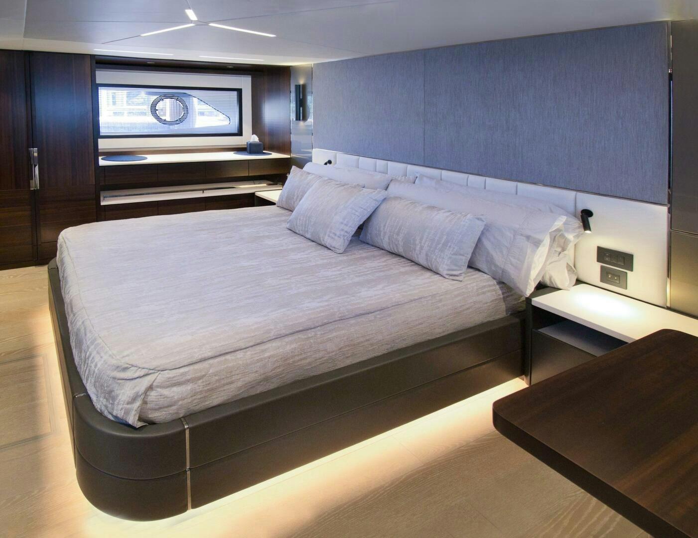 a bed in a room aboard LAGO PARADISE Yacht for Sale