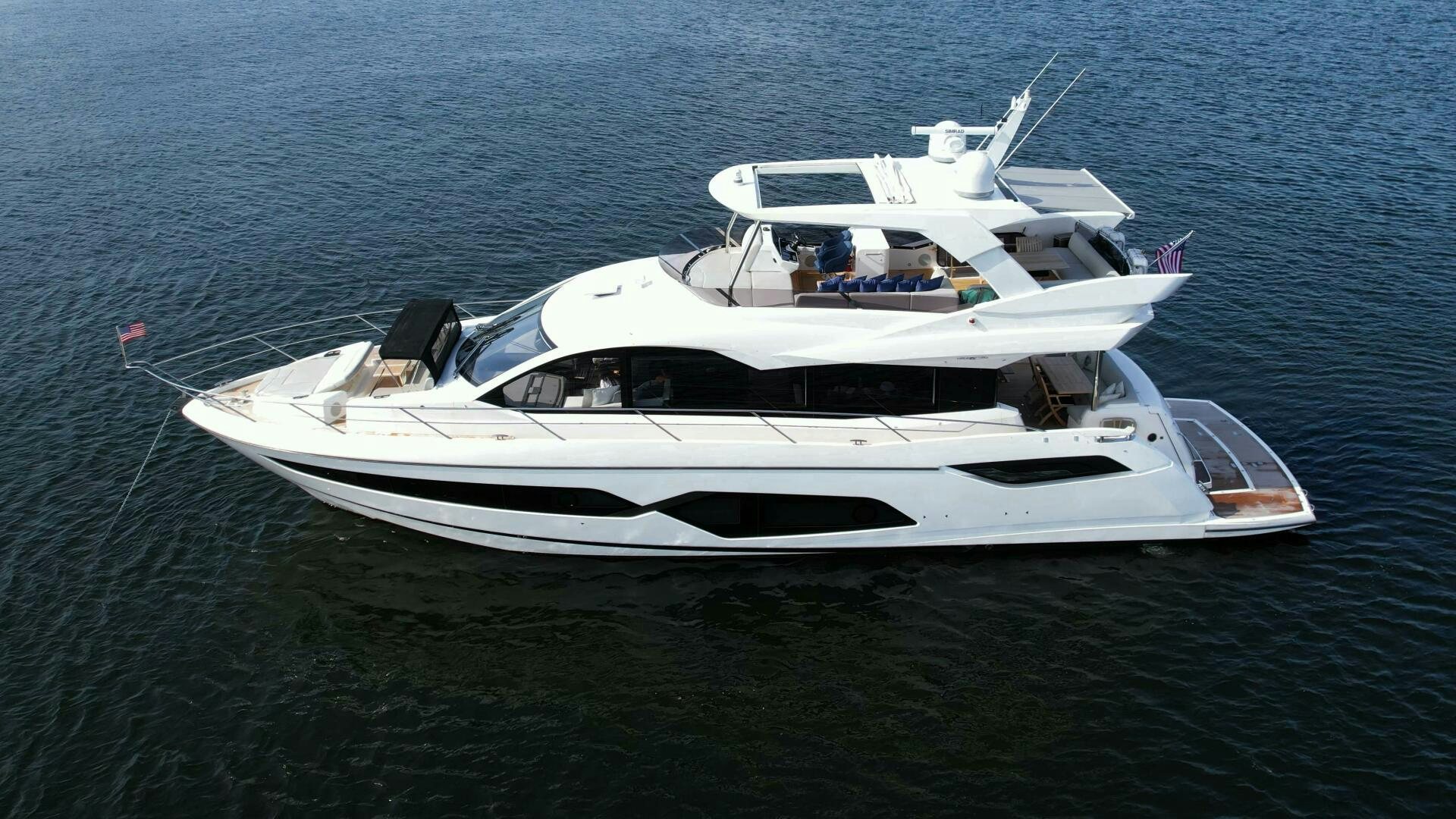 a white yacht on the water aboard LAGO PARADISE Yacht for Sale