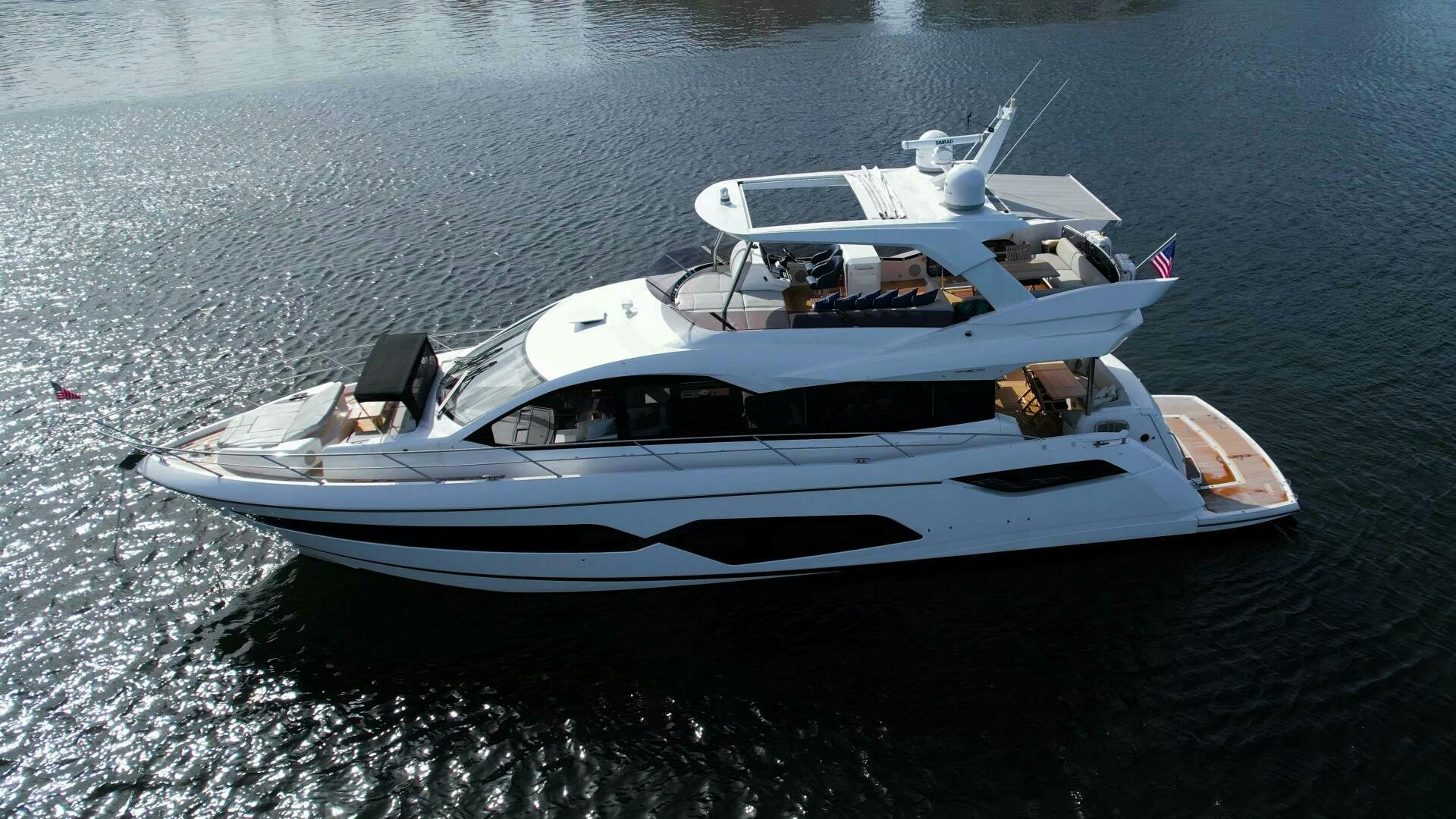 a white boat on the water aboard LAGO PARADISE Yacht for Sale