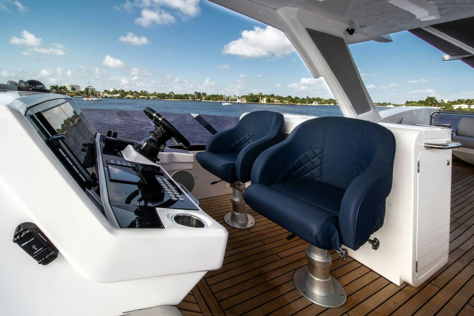 a car with a screen on the dashboard aboard LAGO PARADISE Yacht for Sale