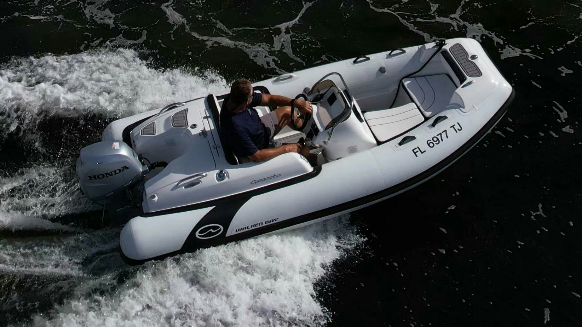 a person driving a jet plane aboard LAGO PARADISE Yacht for Sale