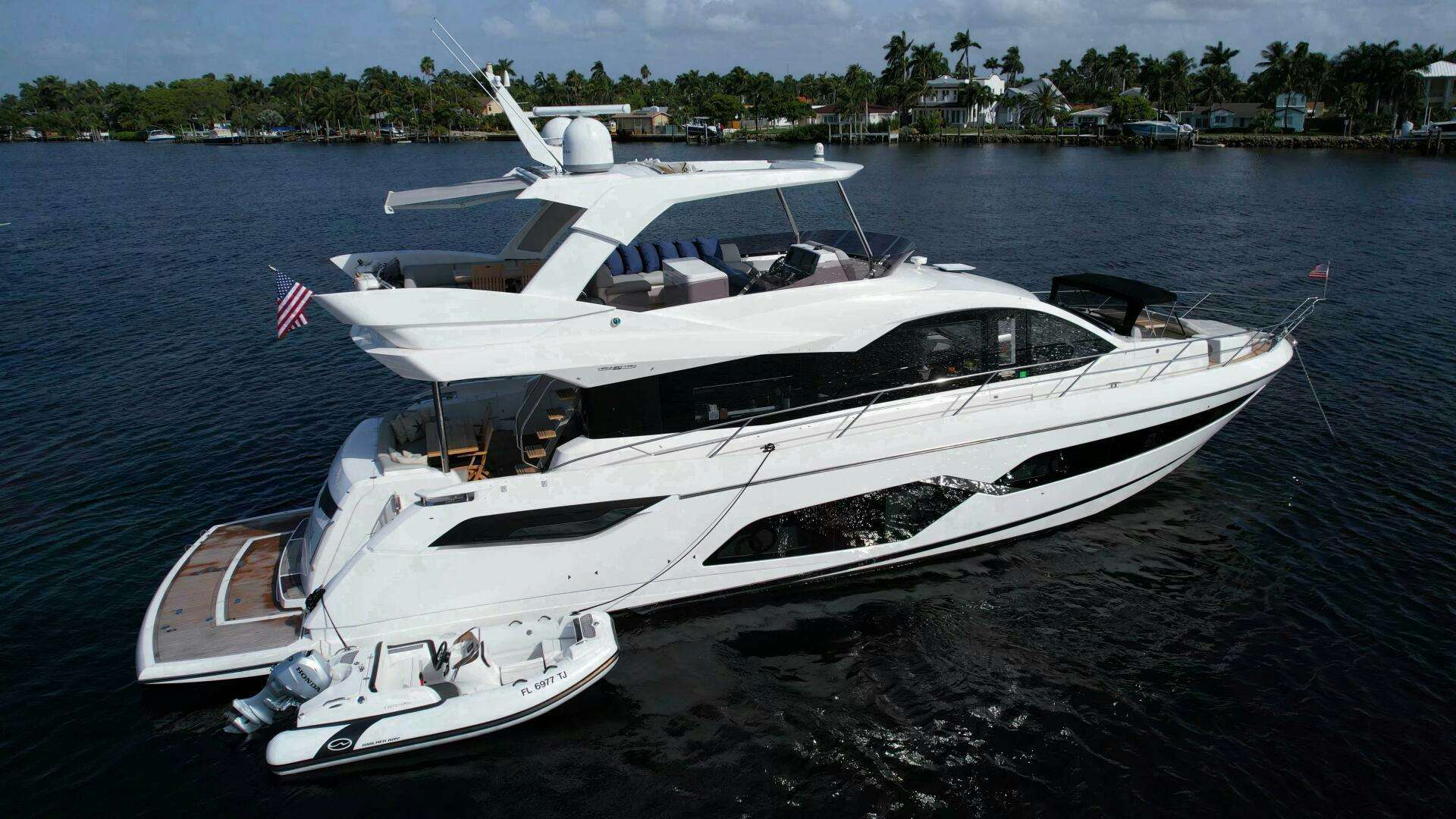 a white yacht on the water aboard LAGO PARADISE Yacht for Sale