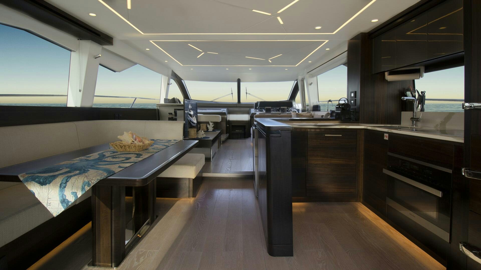 a room with a bed and desk aboard LAGO PARADISE Yacht for Sale
