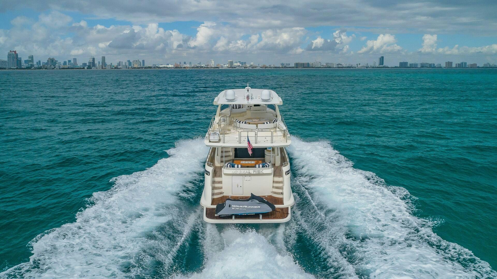 a boat on the water aboard MINIMAL RISK Yacht for Sale