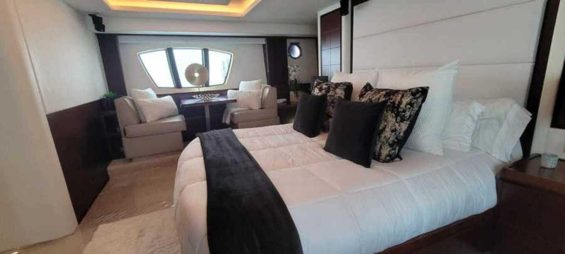 a large bed in a room aboard MINIMAL RISK Yacht for Sale