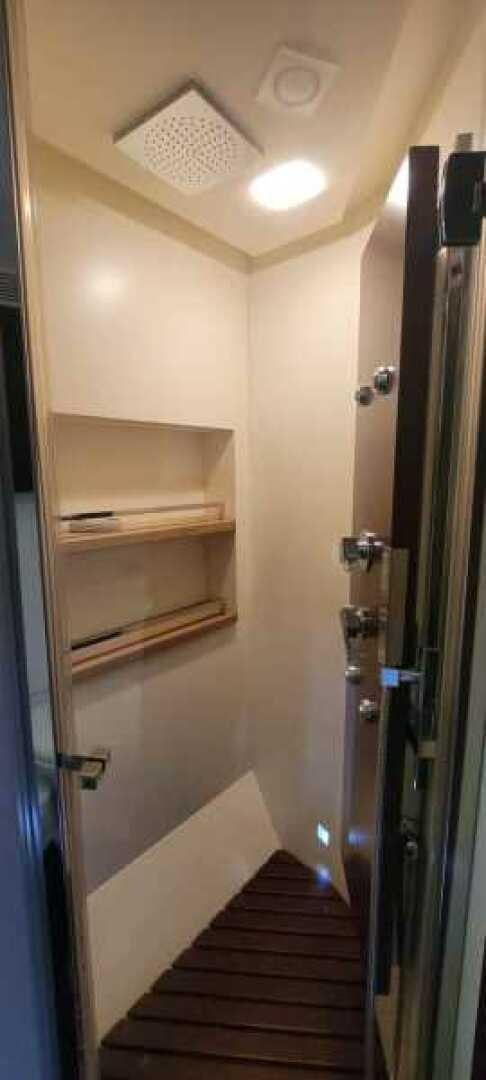 a wooden staircase in a room aboard MINIMAL RISK Yacht for Sale