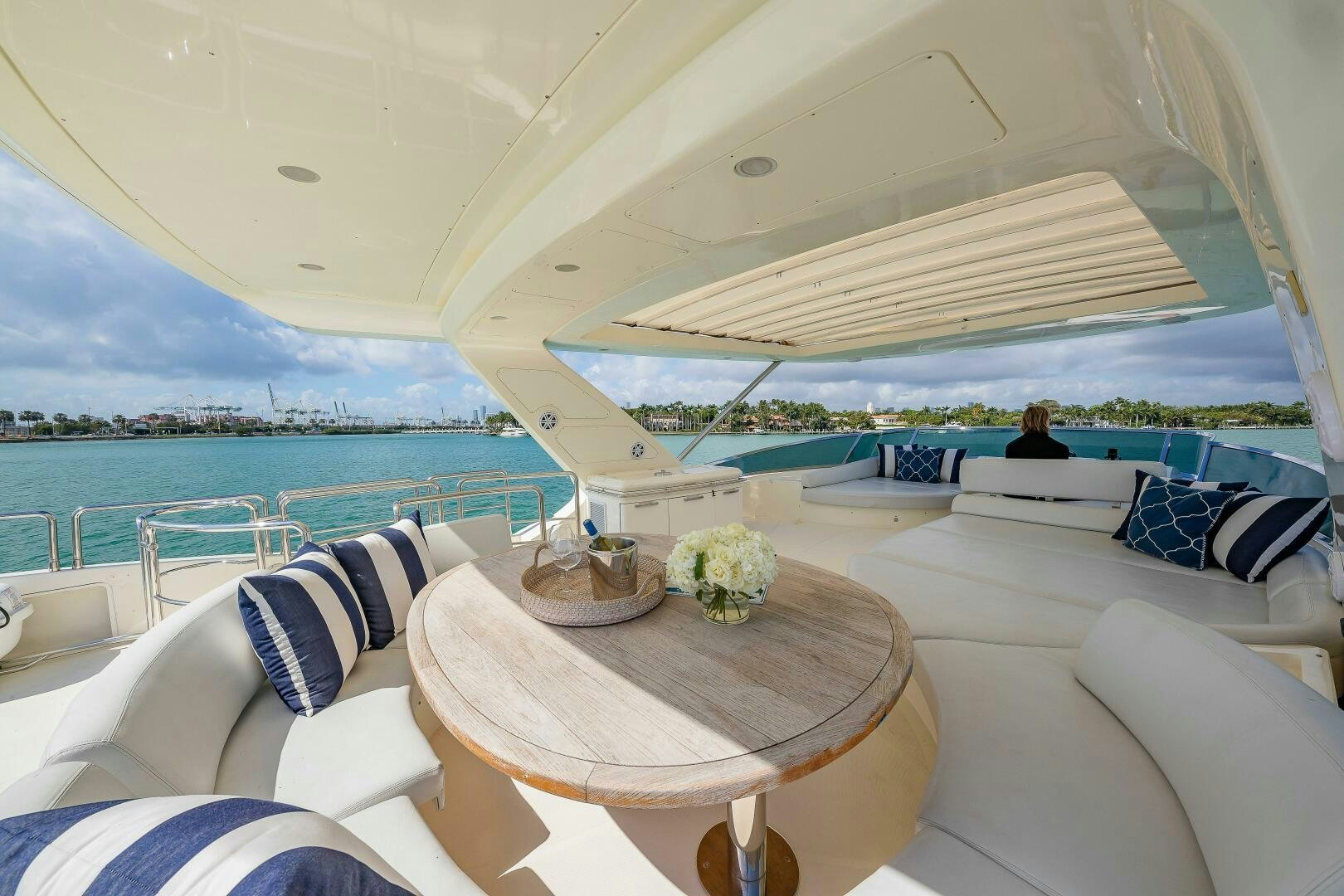 a room with a table and chairs aboard MINIMAL RISK Yacht for Sale