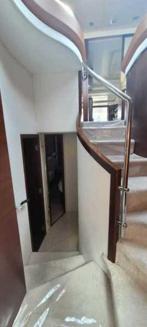 a hallway with a glass door aboard MINIMAL RISK Yacht for Sale