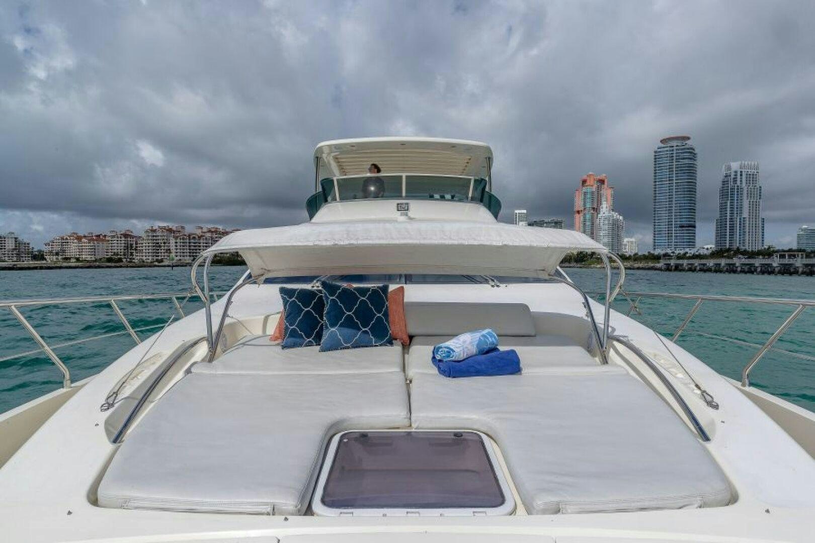 a boat on the water aboard MINIMAL RISK Yacht for Sale